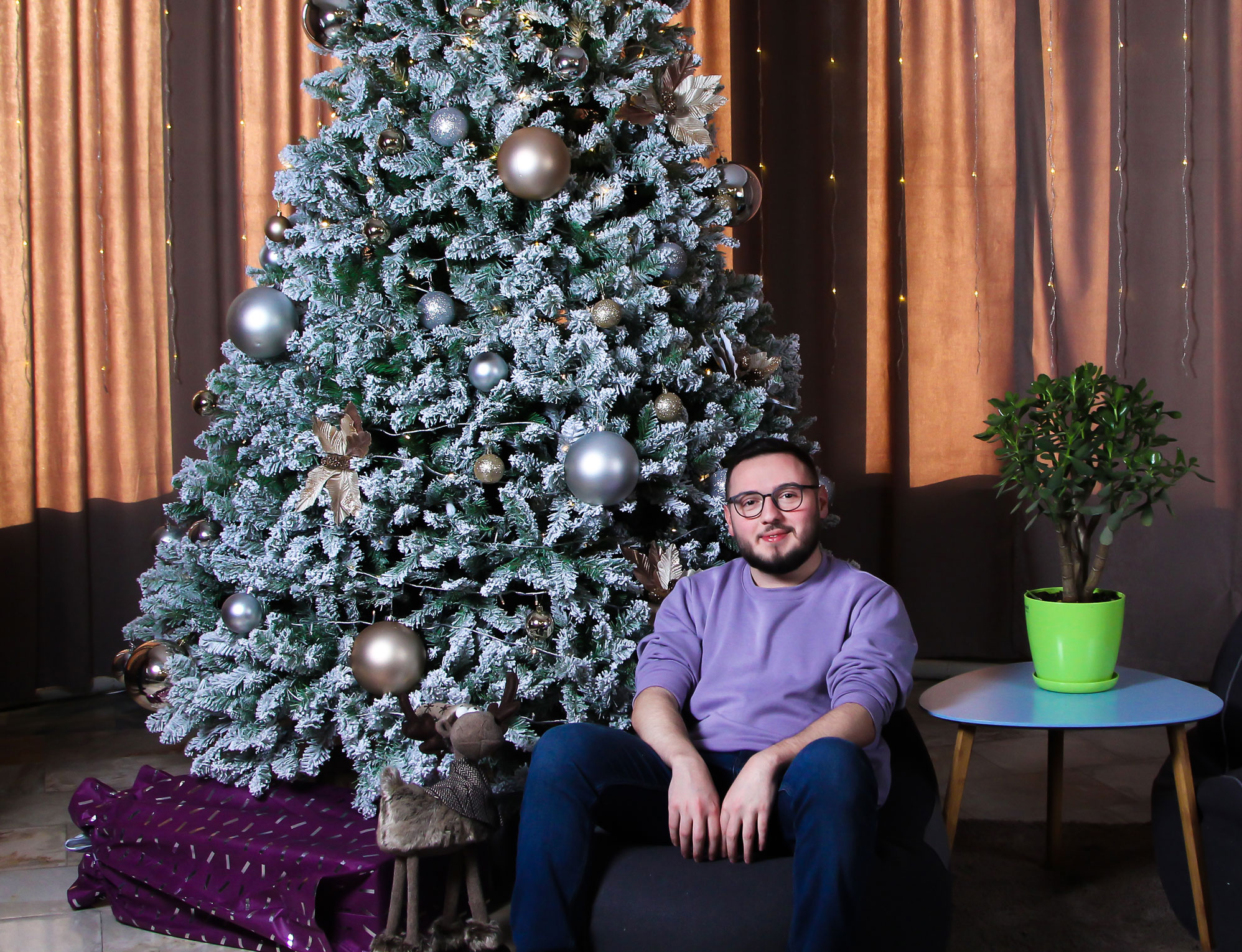 Remote software engineer Garod at CodeRiders software company during New Year party React engineer Garod celebrating New Year with CodeRiders software outsourcing company