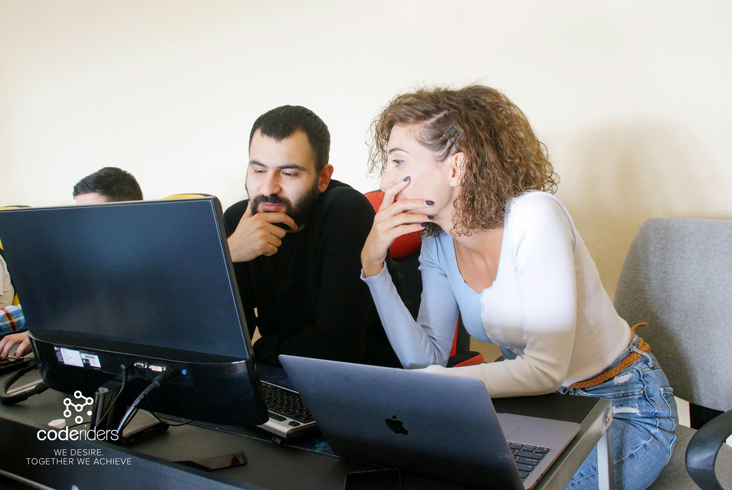 Pair-computing software development CodeRiders software developers doing their everyday work