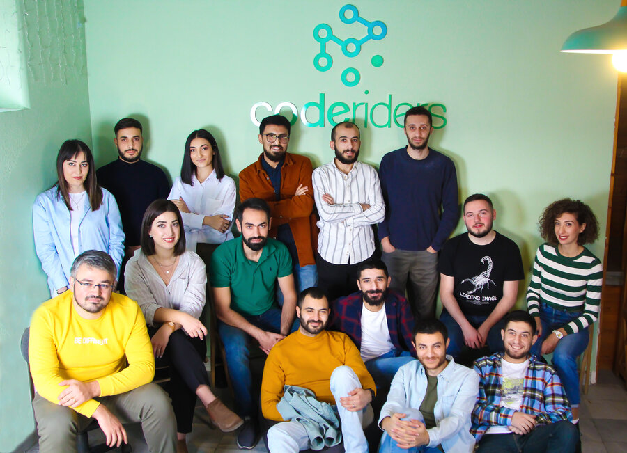 CodeRiders software outsourcing firm during a regular working day CodeRiders software development team at the office