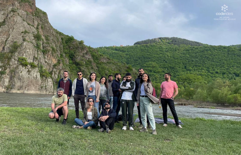 Team building with CodeRiders CodeRiders software development team enjoys spending spare time together in the country side